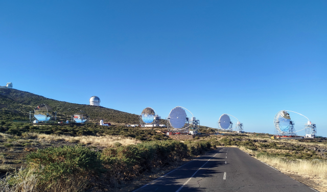 A panoramic view of the Roque de los Muchachos Observatory on La Palma, with the new LST telescope array in the foreground