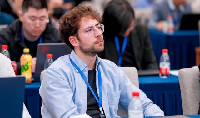 Miguel R. Alarcon, principal investigator at AsteroiDB, at a conference in Hangzhou, China.