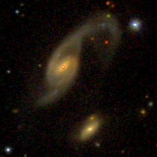 Multiband image of the interacting pair Arp 70 obtained from the SDSS archive. On the left, Arp 70b, the galaxy studied in this work. Credit: SDSS